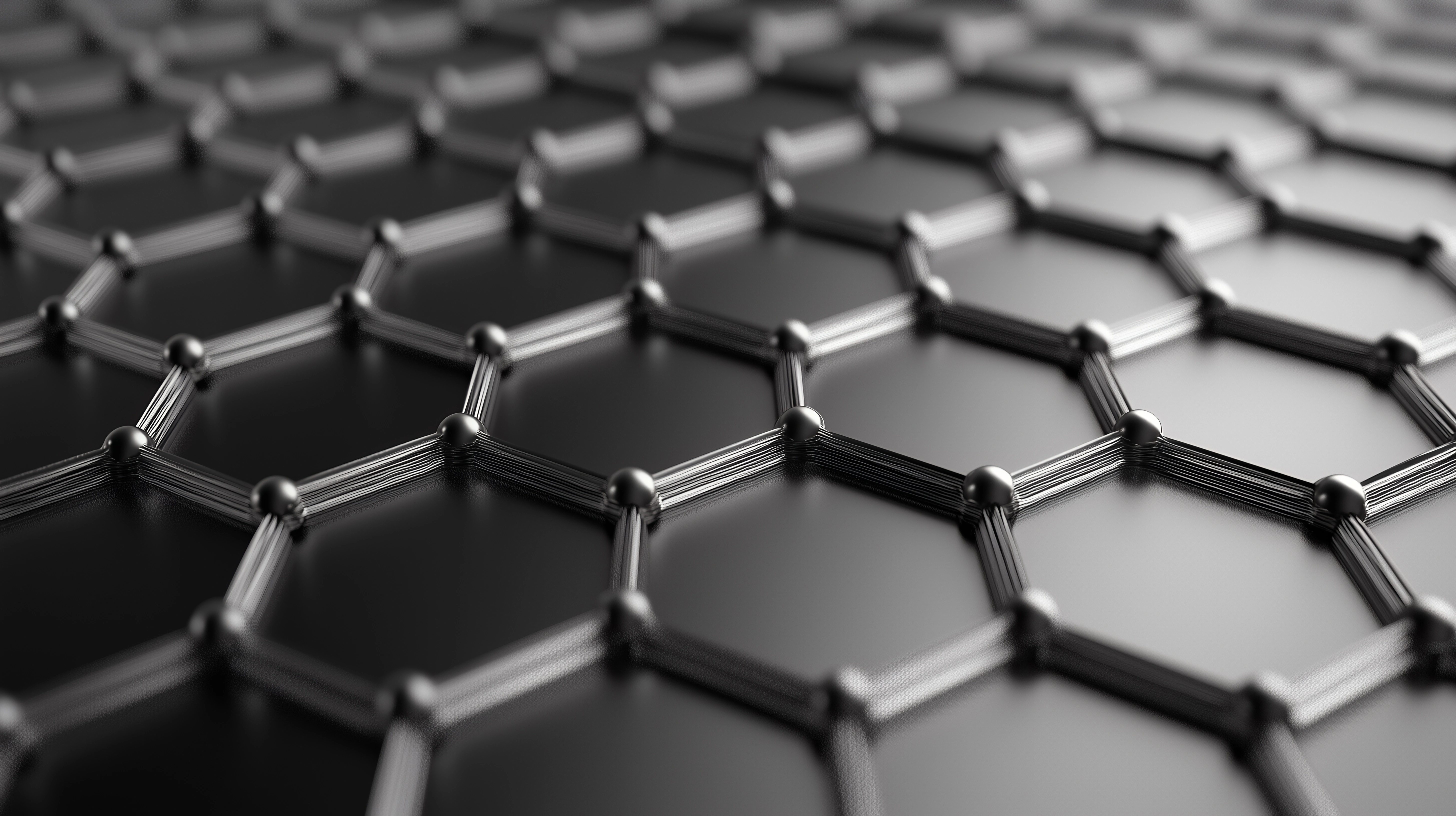 Close-up of a 3D rendered black graphene hexagonal lattice structure.