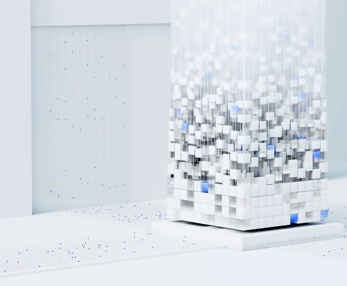 White 3D cube structure composed of smaller cubes suspended by thin transparent strings, with scattered blue and orange spheres on a white surface.