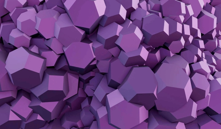 Cluster of purple 3D geometric shapes resembling polyhedrons tightly packed together.