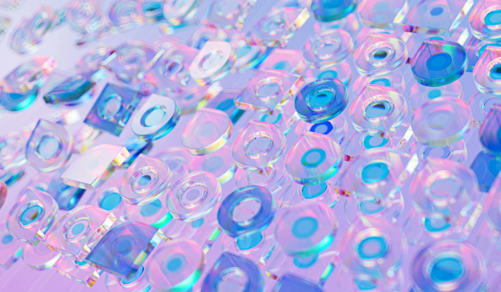 Close-up of translucent, iridescent circular and square shapes with blue and purple hues.