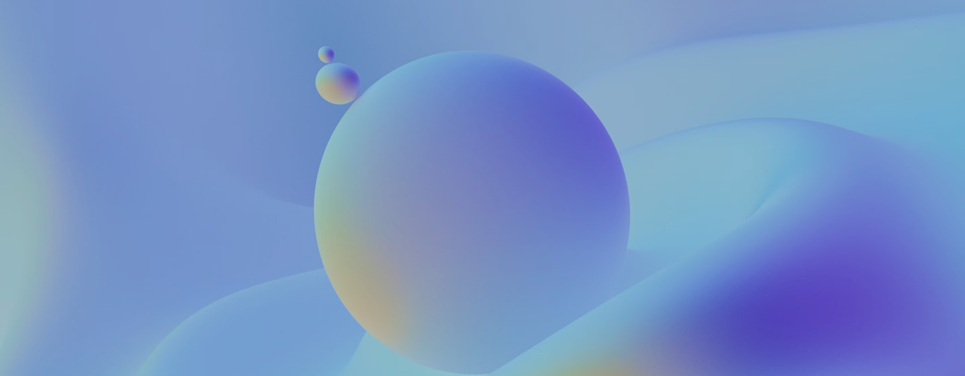 Soft abstract background with smooth gradient spheres in blue and purple tones.