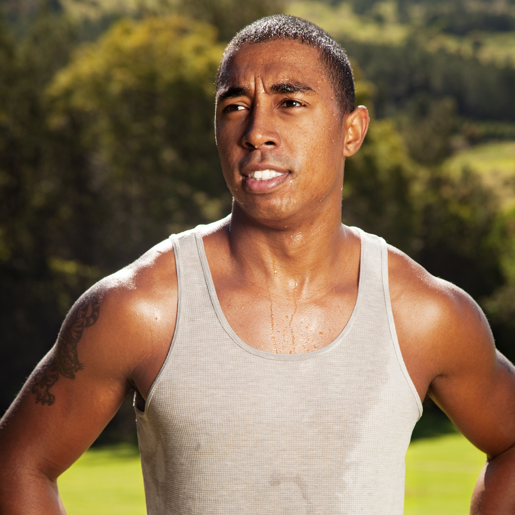 Athlete sweating profusely in the heat.