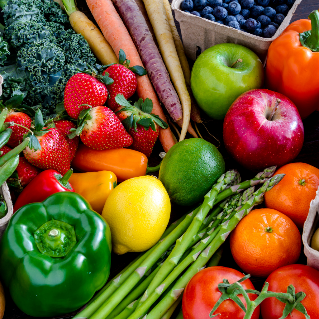 Fresh fruit and vegetables laid out on a table.