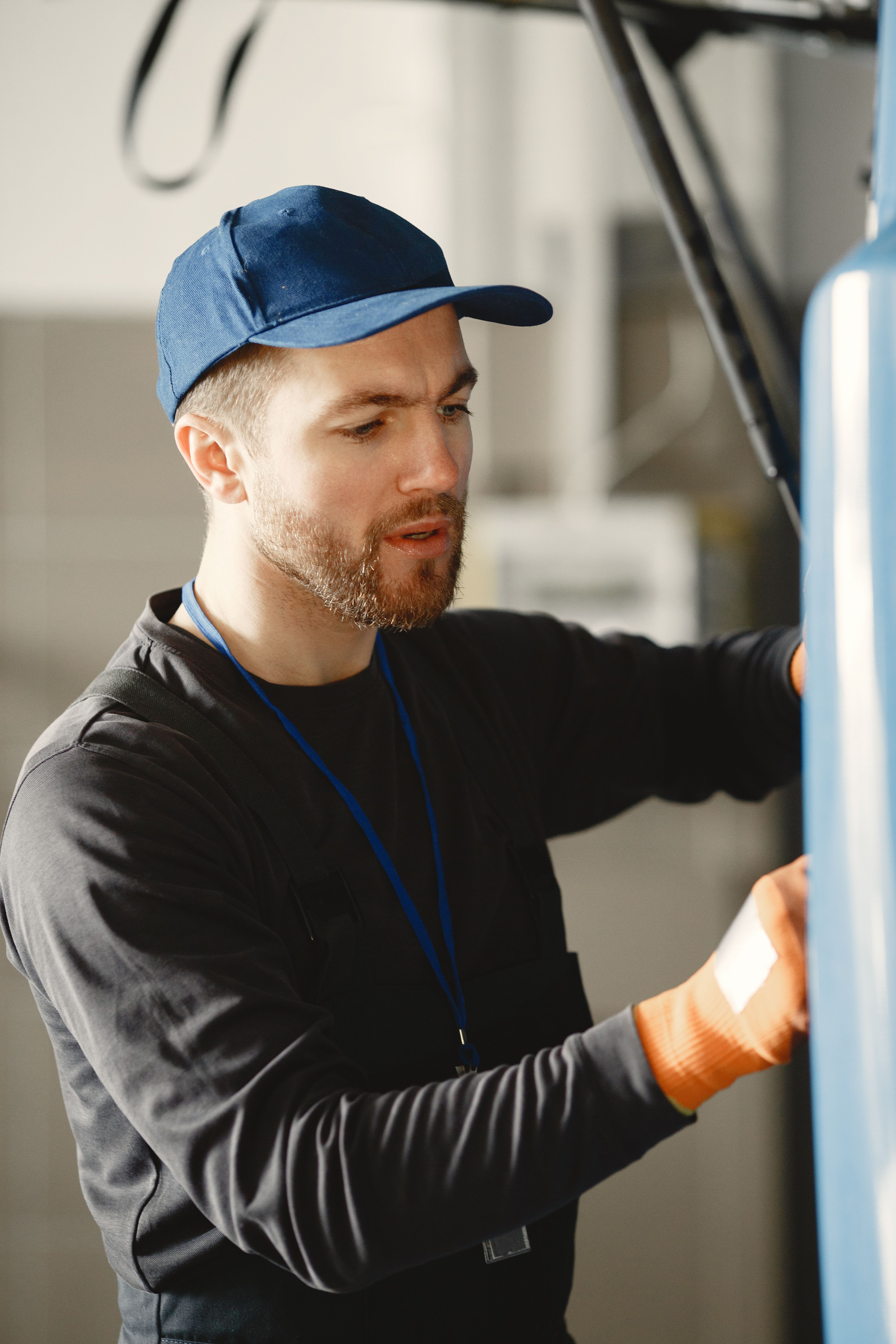 HVAC technician performing maintenance for a home services business