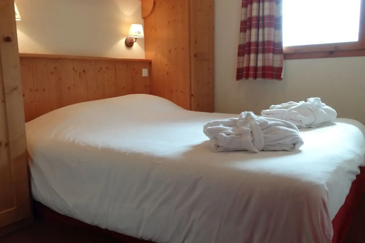 Double bed at Les Alpages de Val Cenis