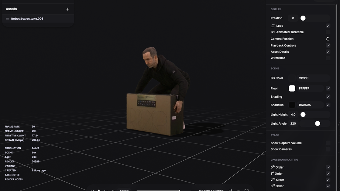 3D software interface showing a man crouching and lifting a large cardboard box labeled 'BOX' against a dark grid background.