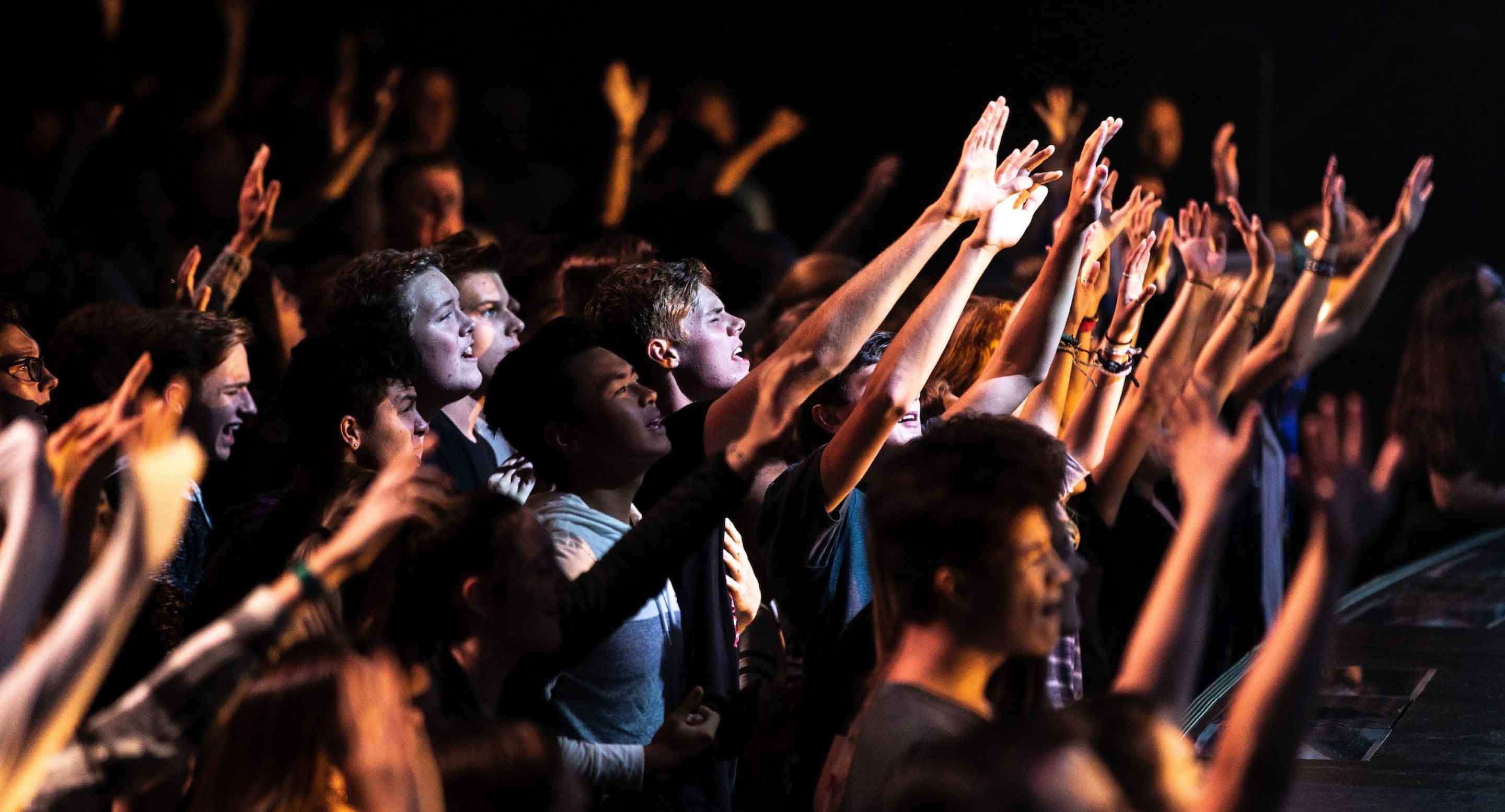 A group of believers worshipping God in song