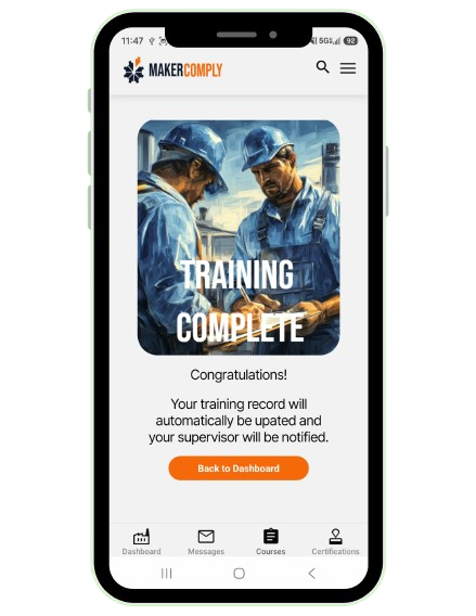 Two construction workers in blue uniforms and helmets reviewing documents with text 'Training Complete'.