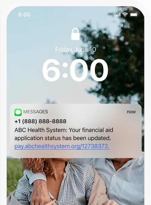 Smartphone lock screen showing 6:00, Friday, June 10, with a notification from ABC Health System about financial aid application status update and a partially visible smiling couple in the background.