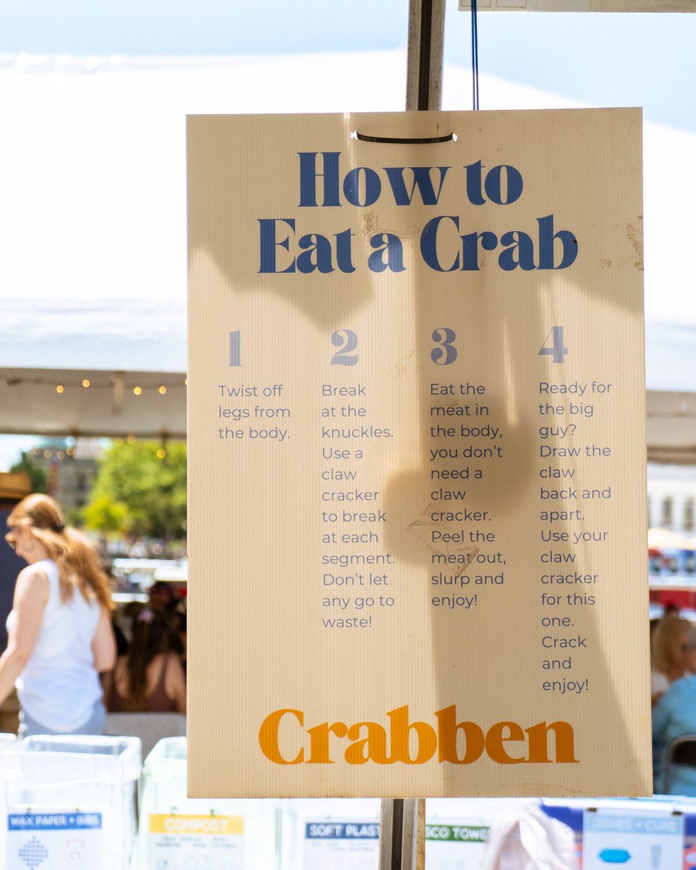 A How to Eat a Crab instruction sign on the tables at BC CrabFest 2026