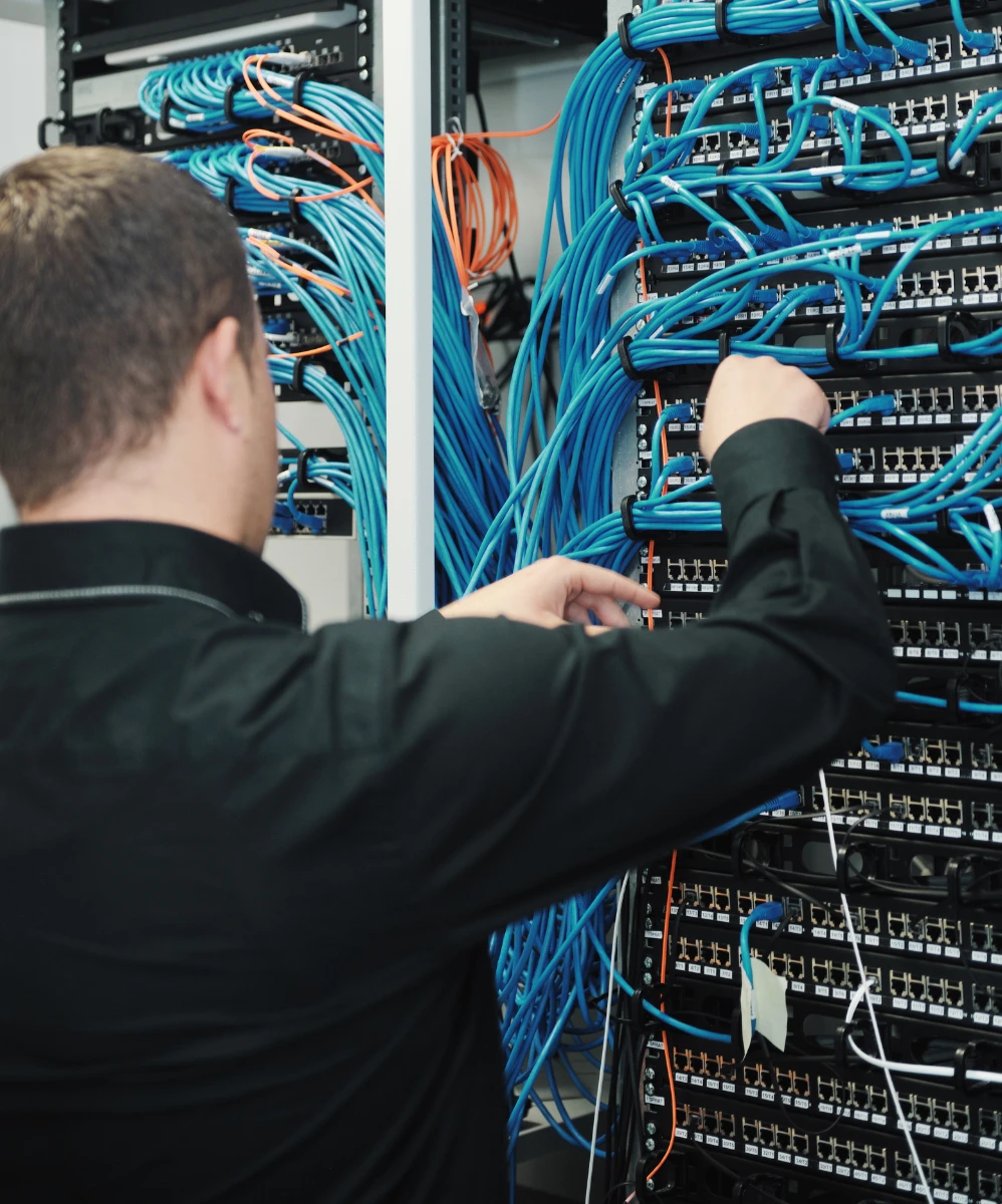 Tech managing wire management panel