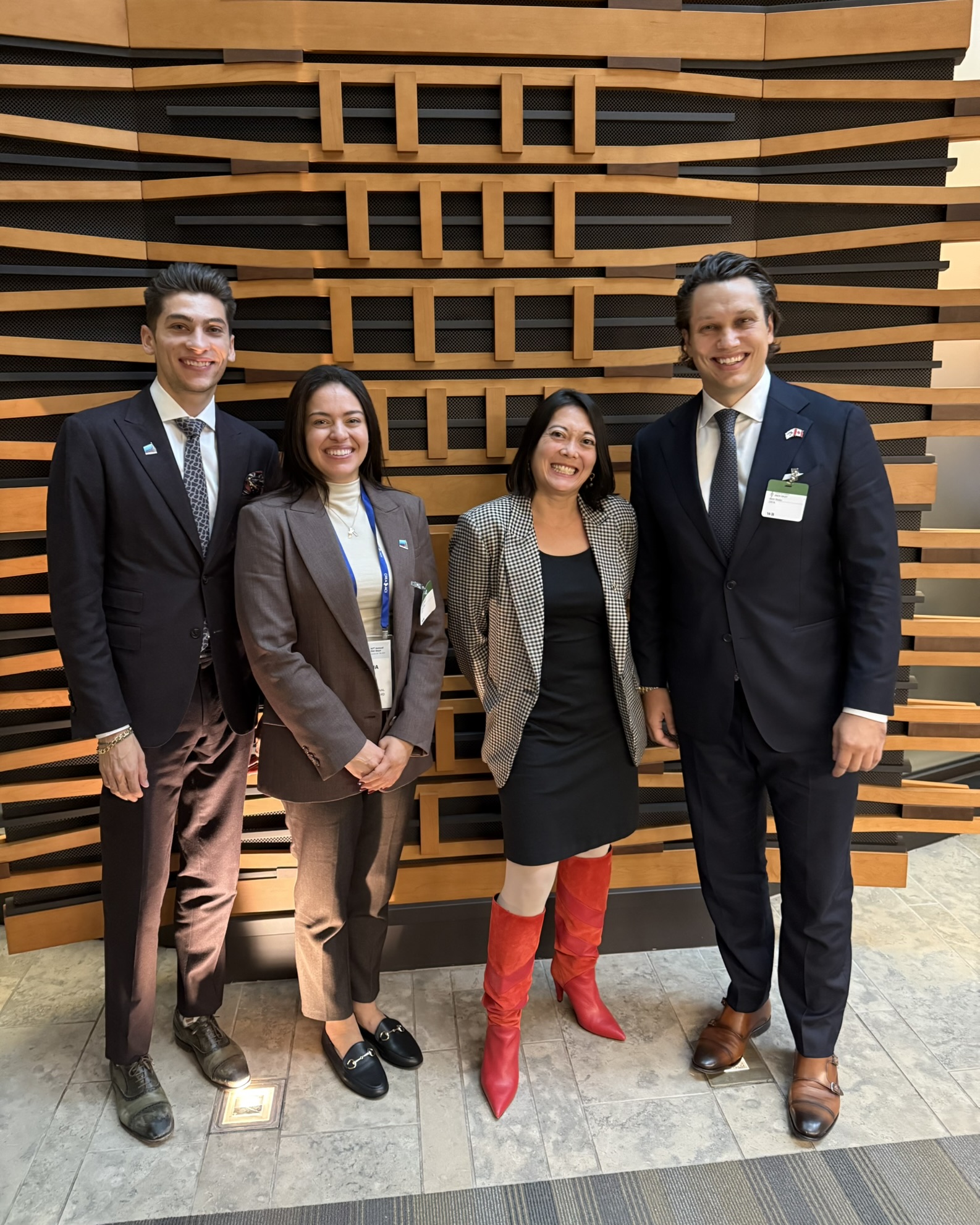 image of passengers boarding a bus at a city bus station