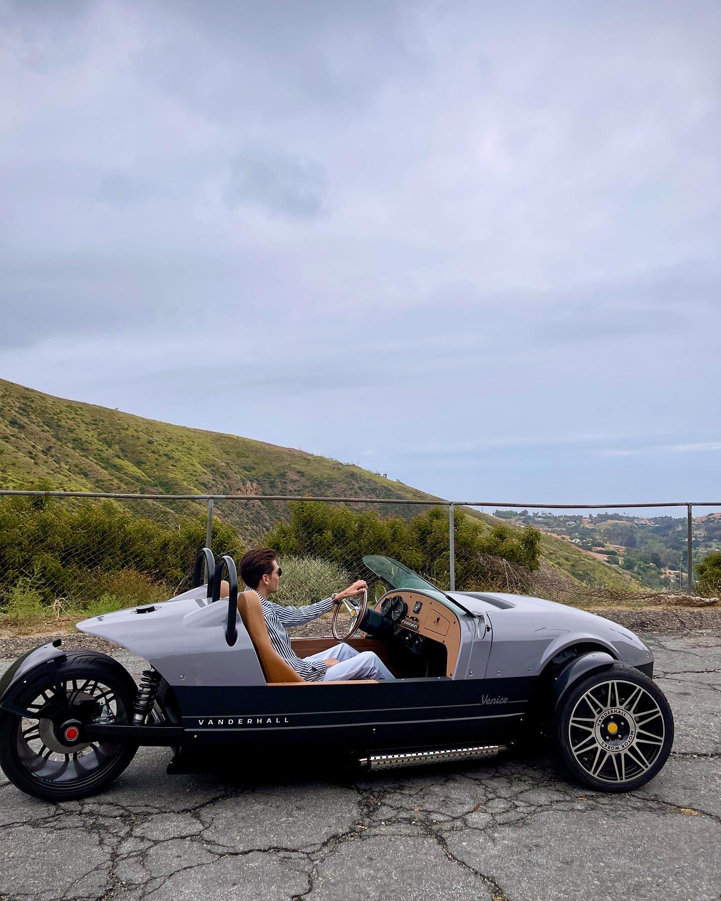 image of passengers boarding a bus at a city bus station