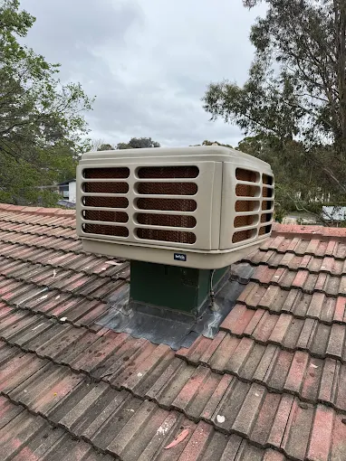 Rooftop evaporative air conditioning unit for heating and cooling in Canberra.