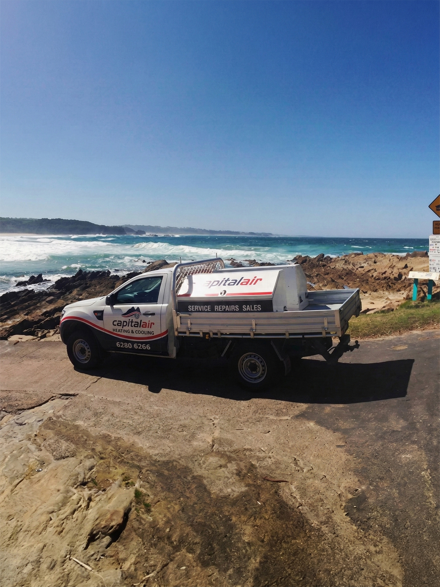 Capital Air branded vehicle supporting local air conditioning services.