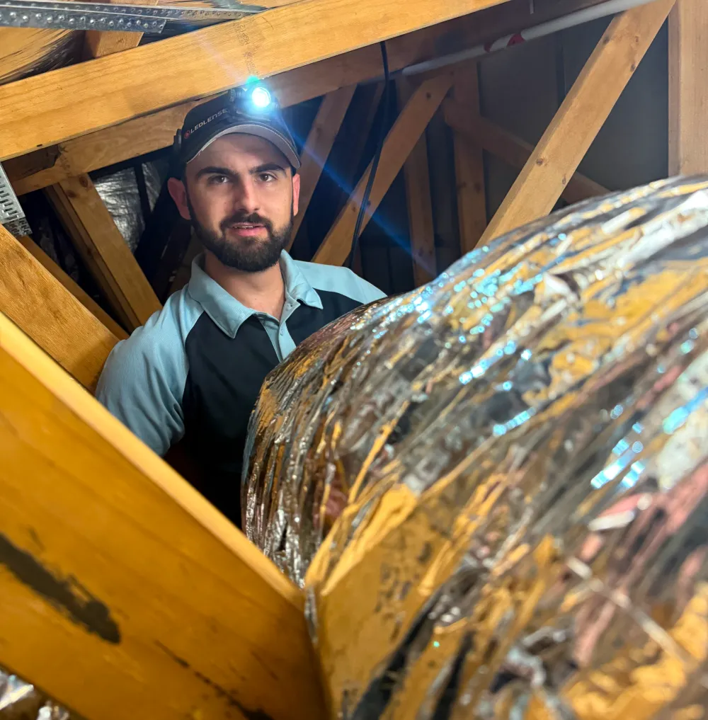 Capital Air Group technician providing reliable air conditioning services.