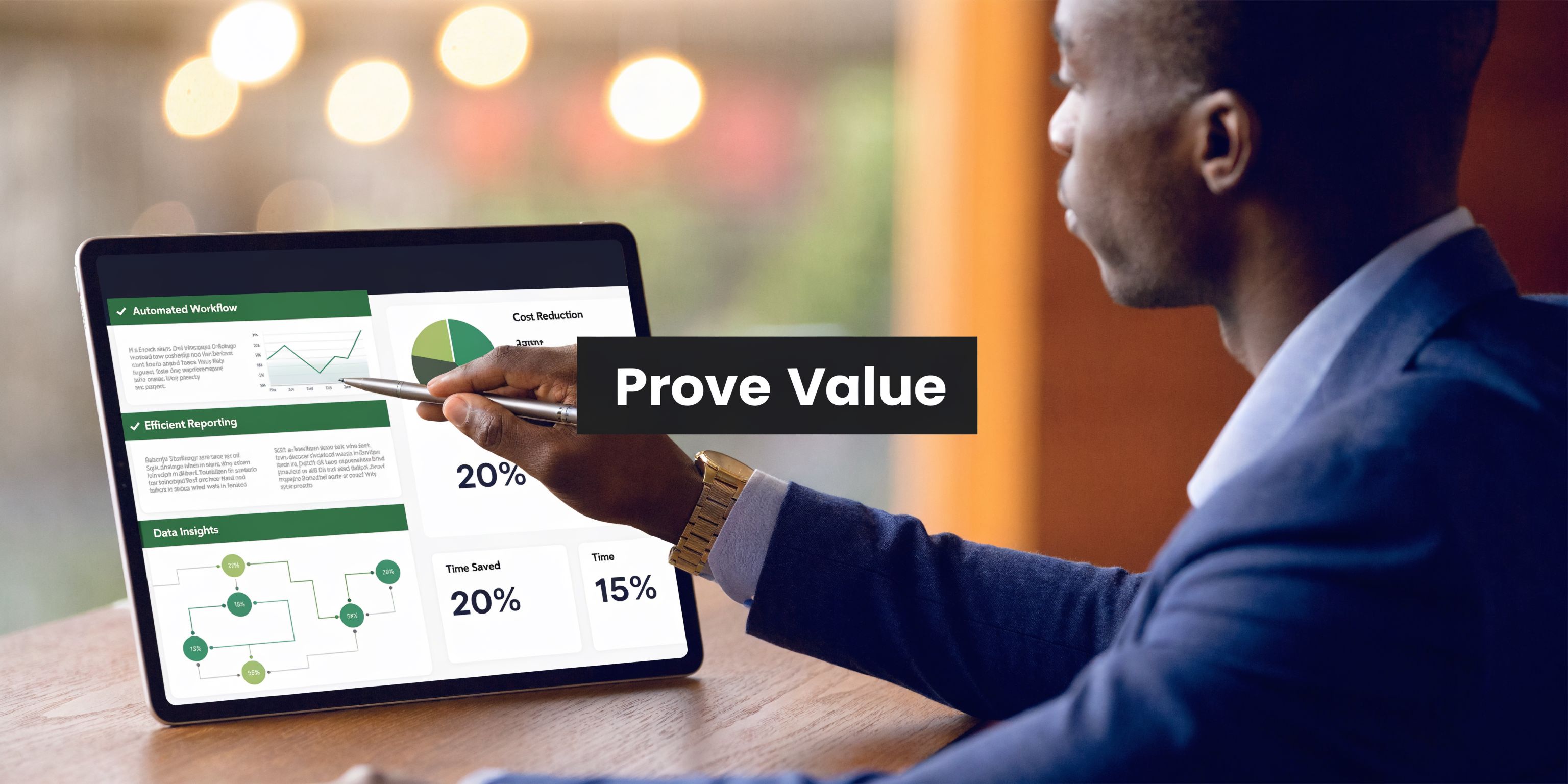 A professional man using a stylus to point at business performance data on a tablet screen.