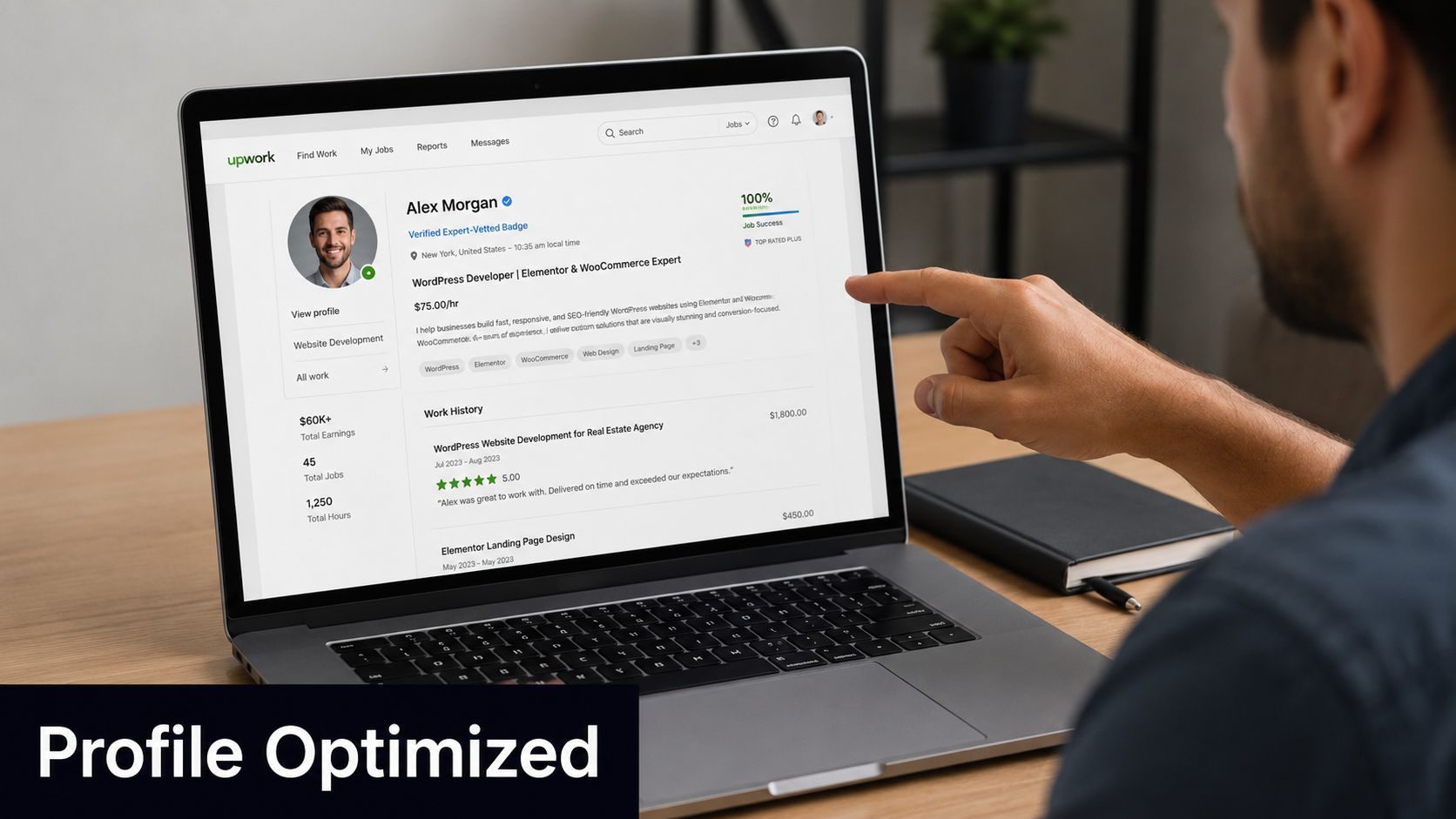 A professional developer analyzing their optimized Upwork profile on a laptop screen while working at a desk.