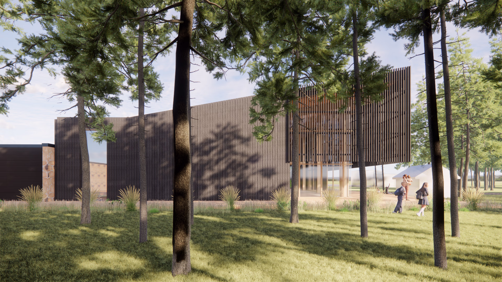 Modern building with vertical wooden slats surrounded by tall trees and grassy area with people walking nearby.