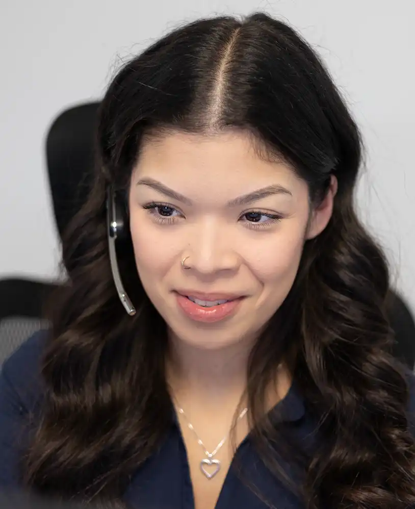 Insurance advisor talking to customer on phone.