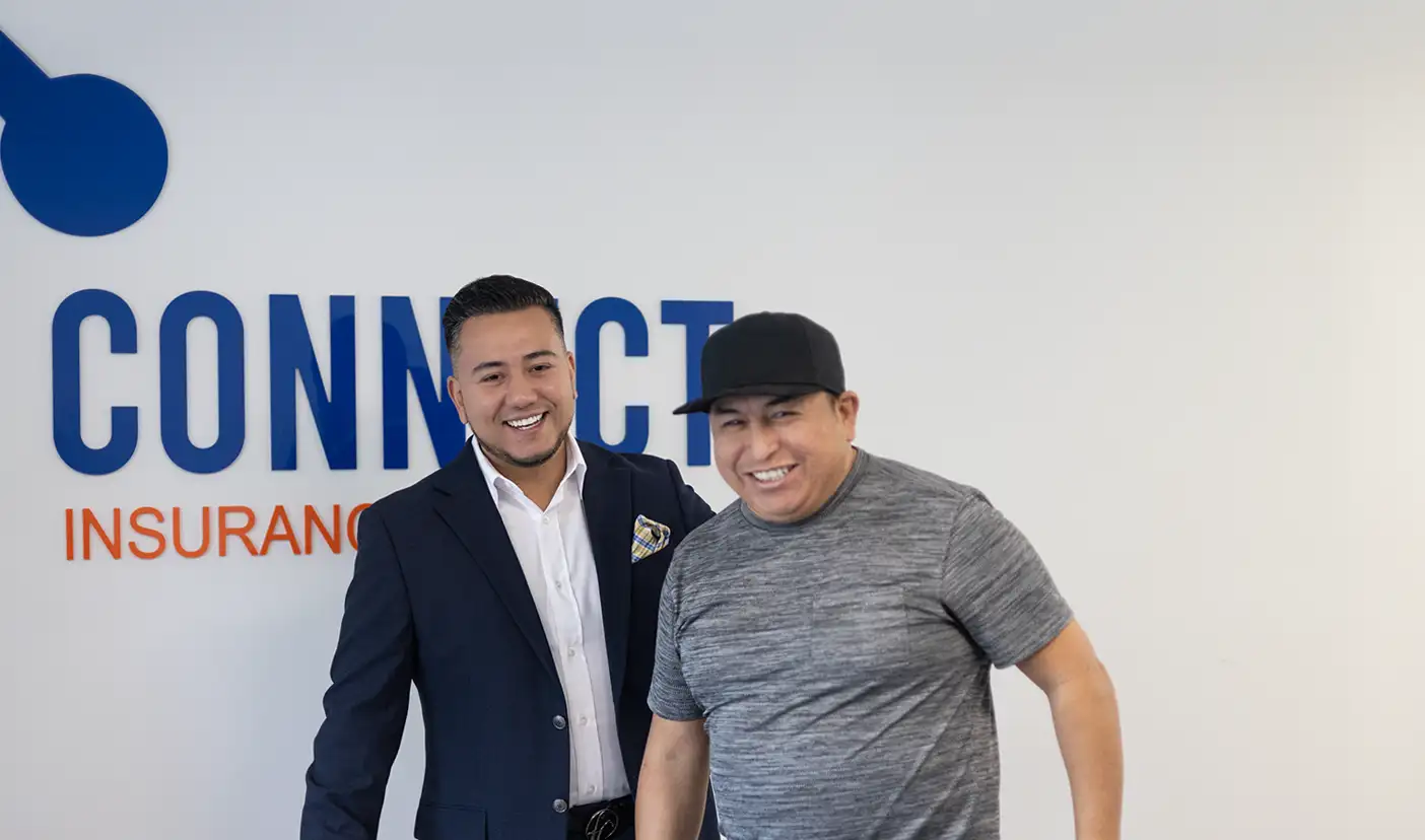 Insurance advisor having a good laugh with client.