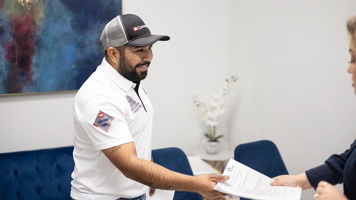 Roofer getting insurance policy