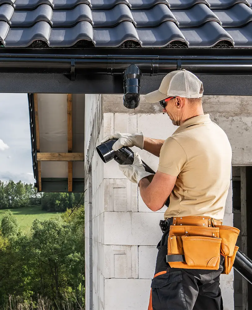 Expert installing a gutter.