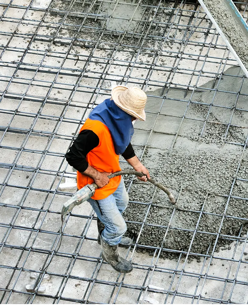 Concrete contractor pouring.