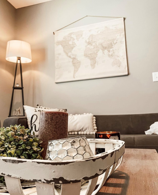 living area with sofa and lamp