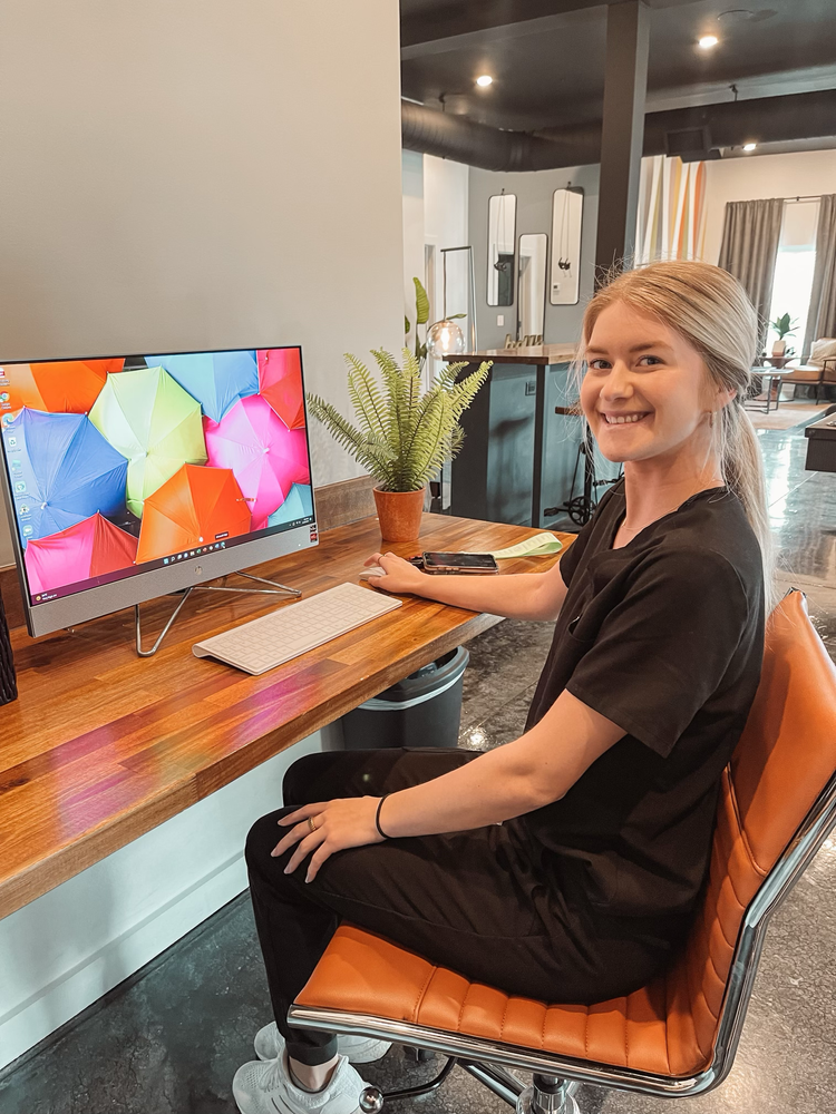 girl at desk on computer