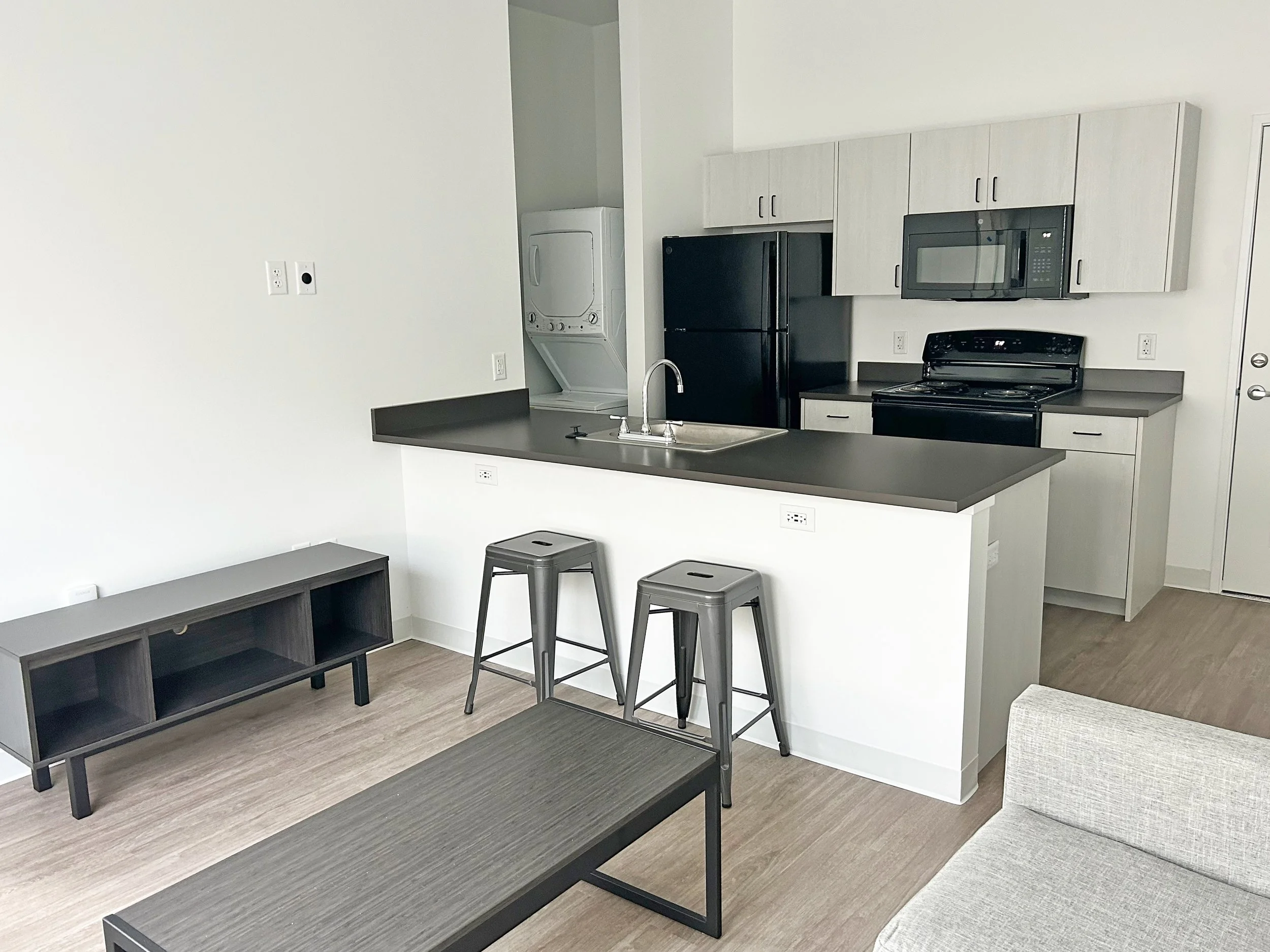 Kitchen with black appliances