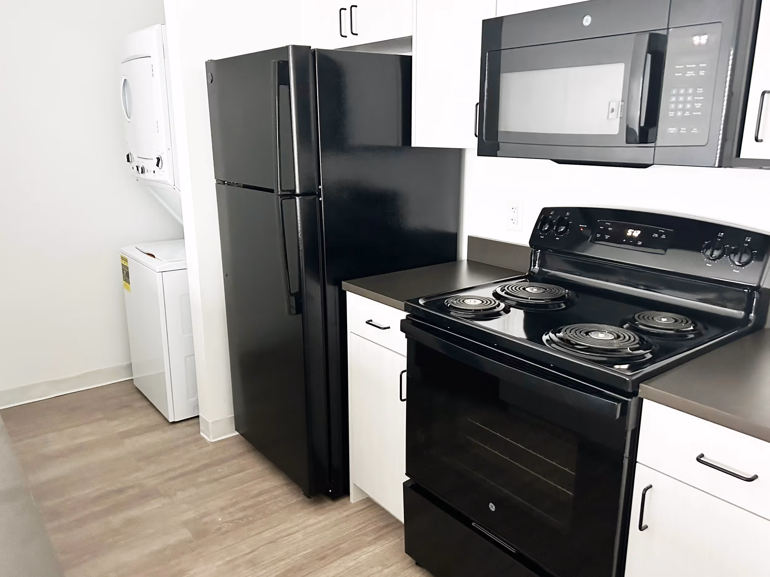 Black appliances in kitchen