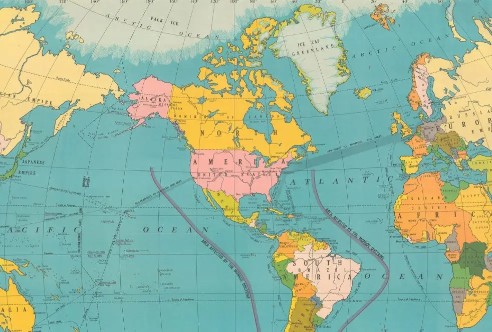 A world map featuring continents colored in yellow and pink, highlighting geographical regions distinctly.