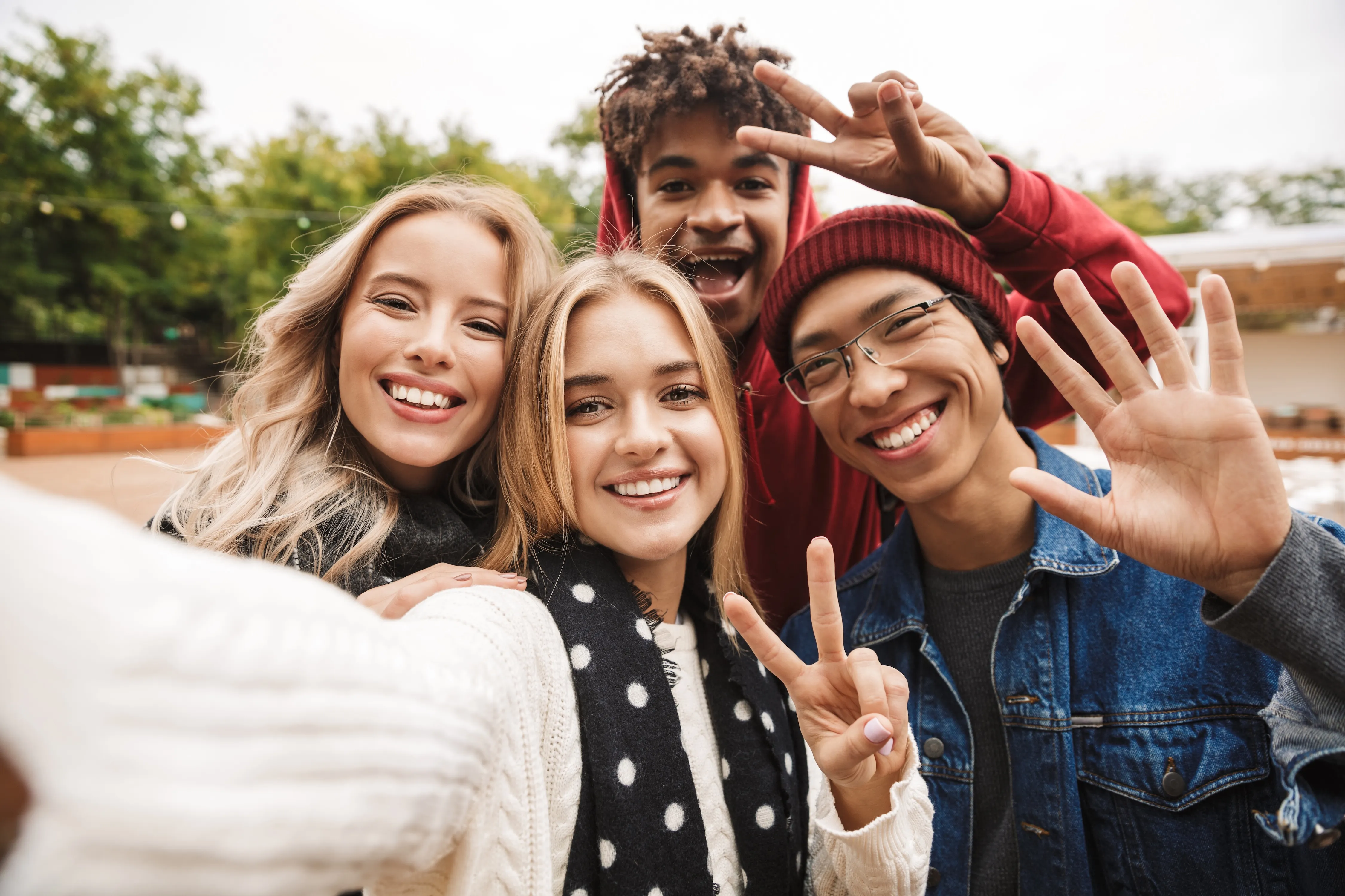 Group of men and women taking a selfie stock image