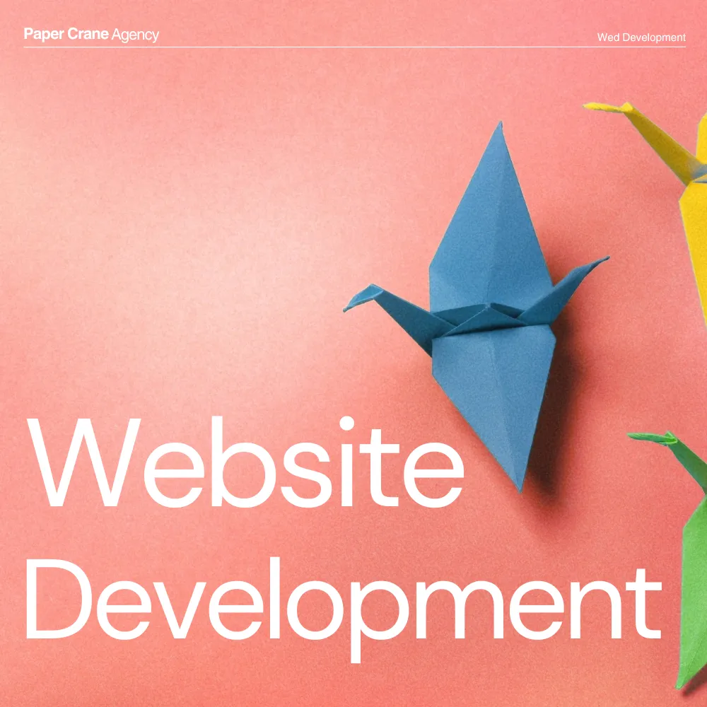 Close-up of colorful origami paper cranes arranged closely together.