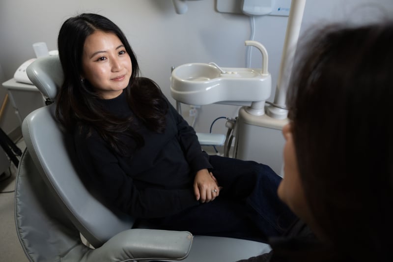 Emergency dentist treating patient at Medford Dental Wellness clinic in Medford, MA