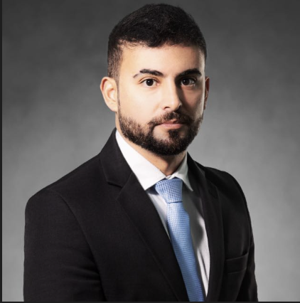 Simple black user profile icon on a beige background.