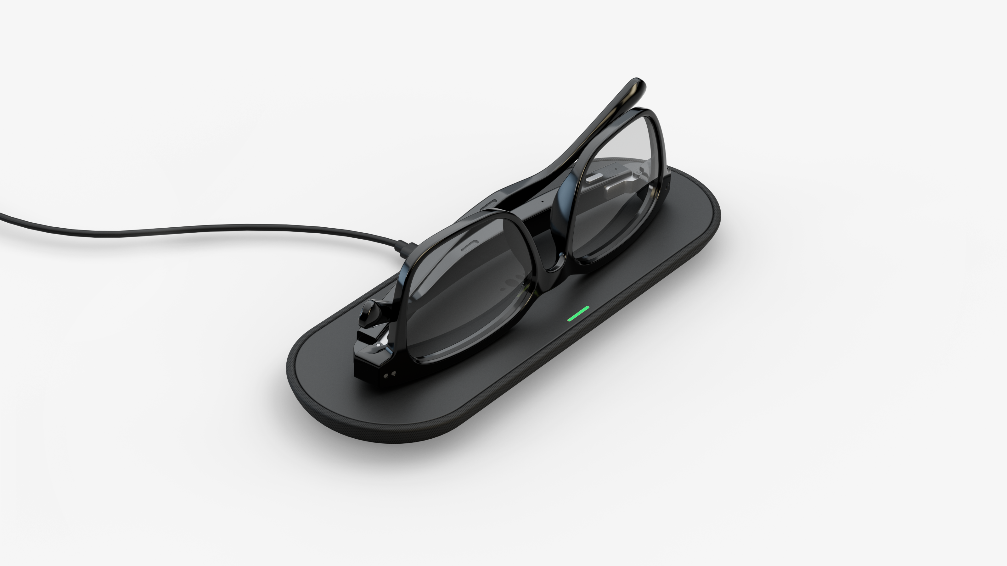 Nuance Audio Glasses resting on wireless charging pad