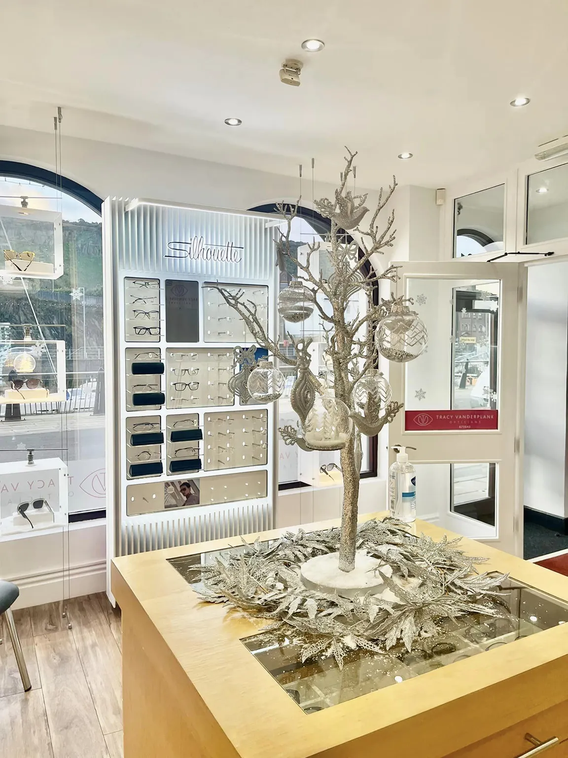 Tracy Vanderplank Opticians interior showcasing designer eyewear frames and professional eye care services