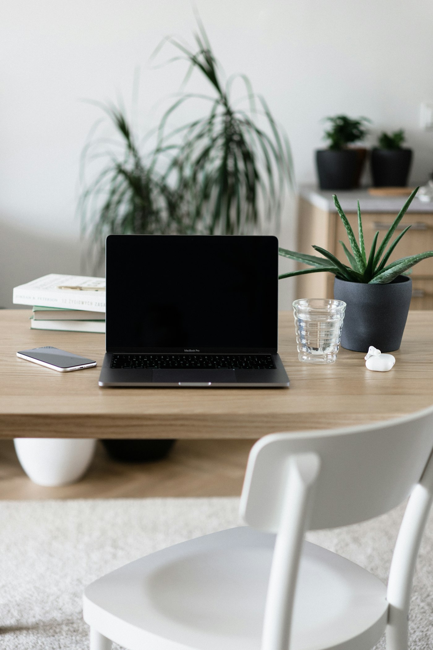 Laptop on a wooden desk for comparing loan options