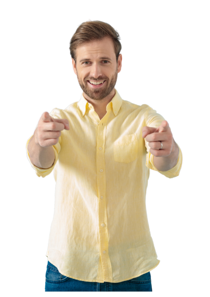 Smiling man with a beard wearing a yellow shirt pointing forward with both hands.