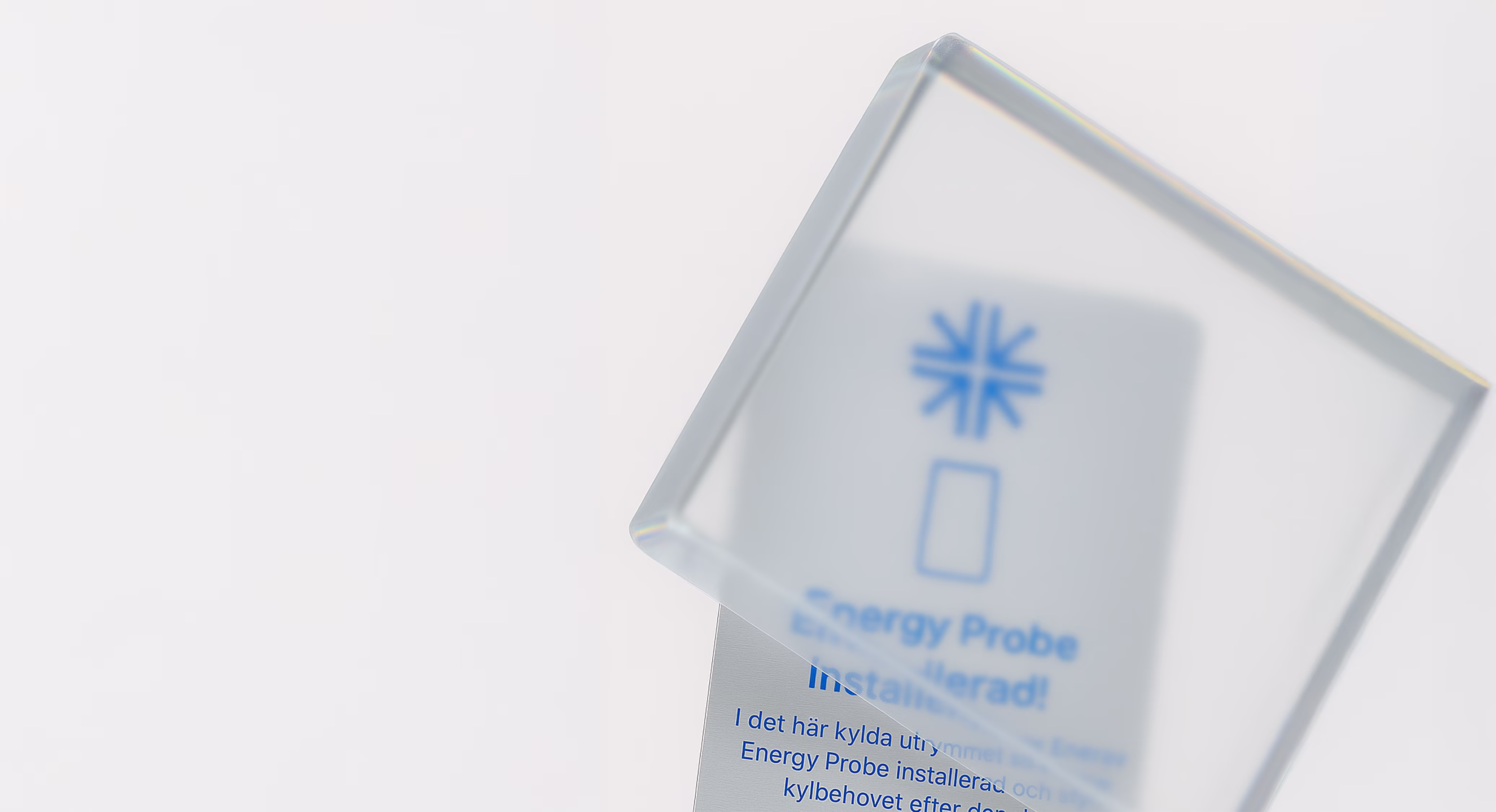 Energy probe certificate behind a glass cube