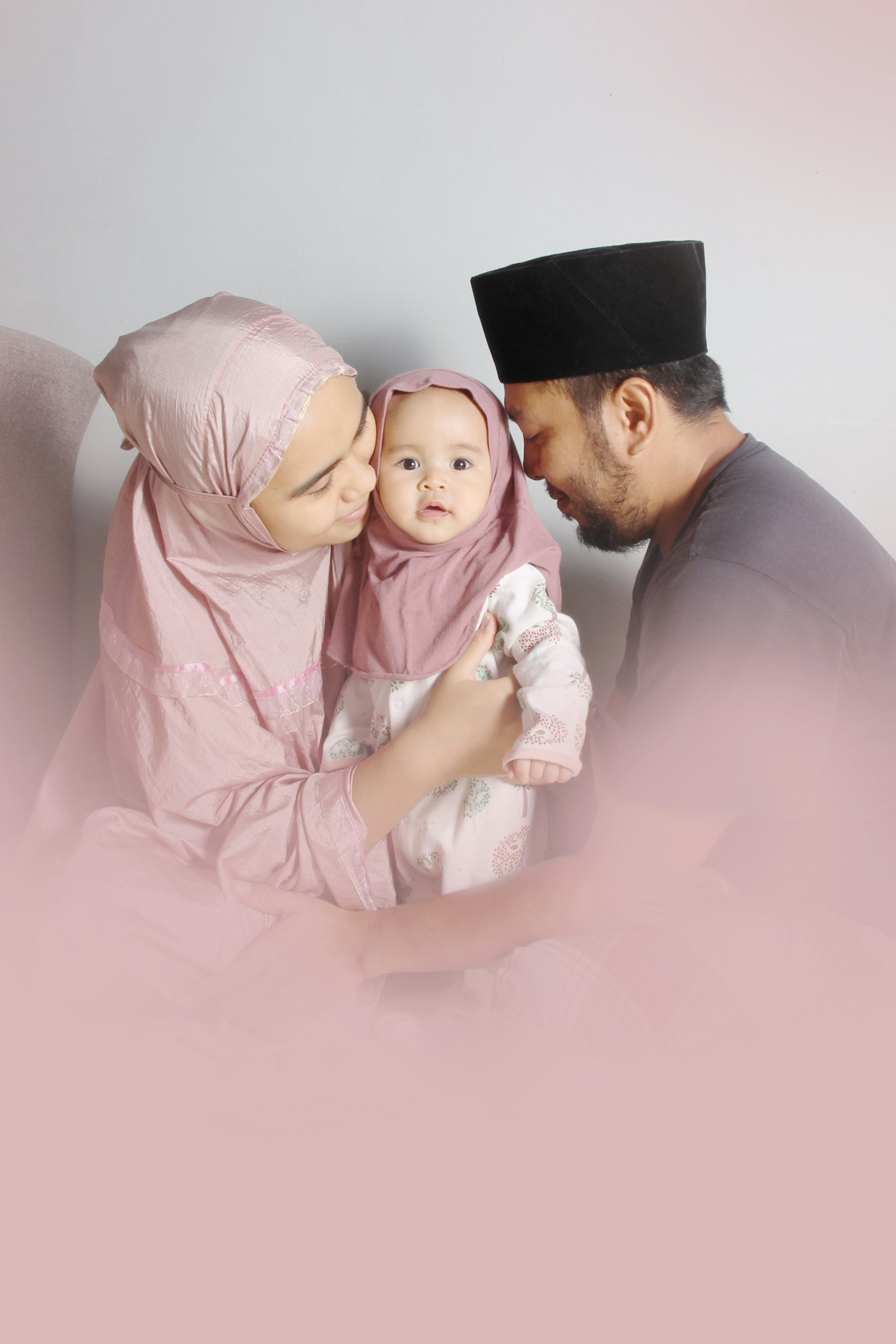 Young family with their baby at home