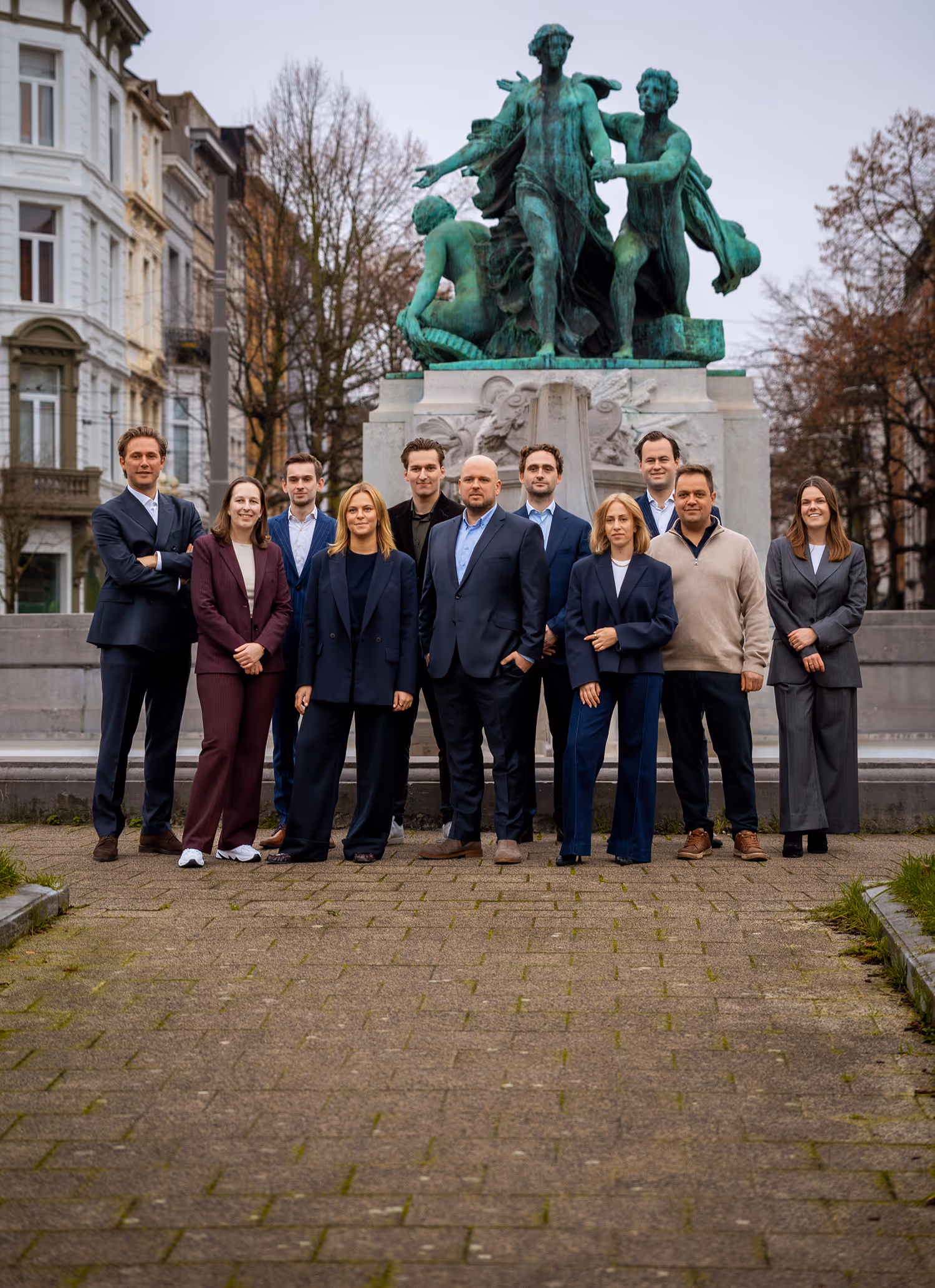 Teamfoto van de Bauwens Vastgoed makelaars en werknemers