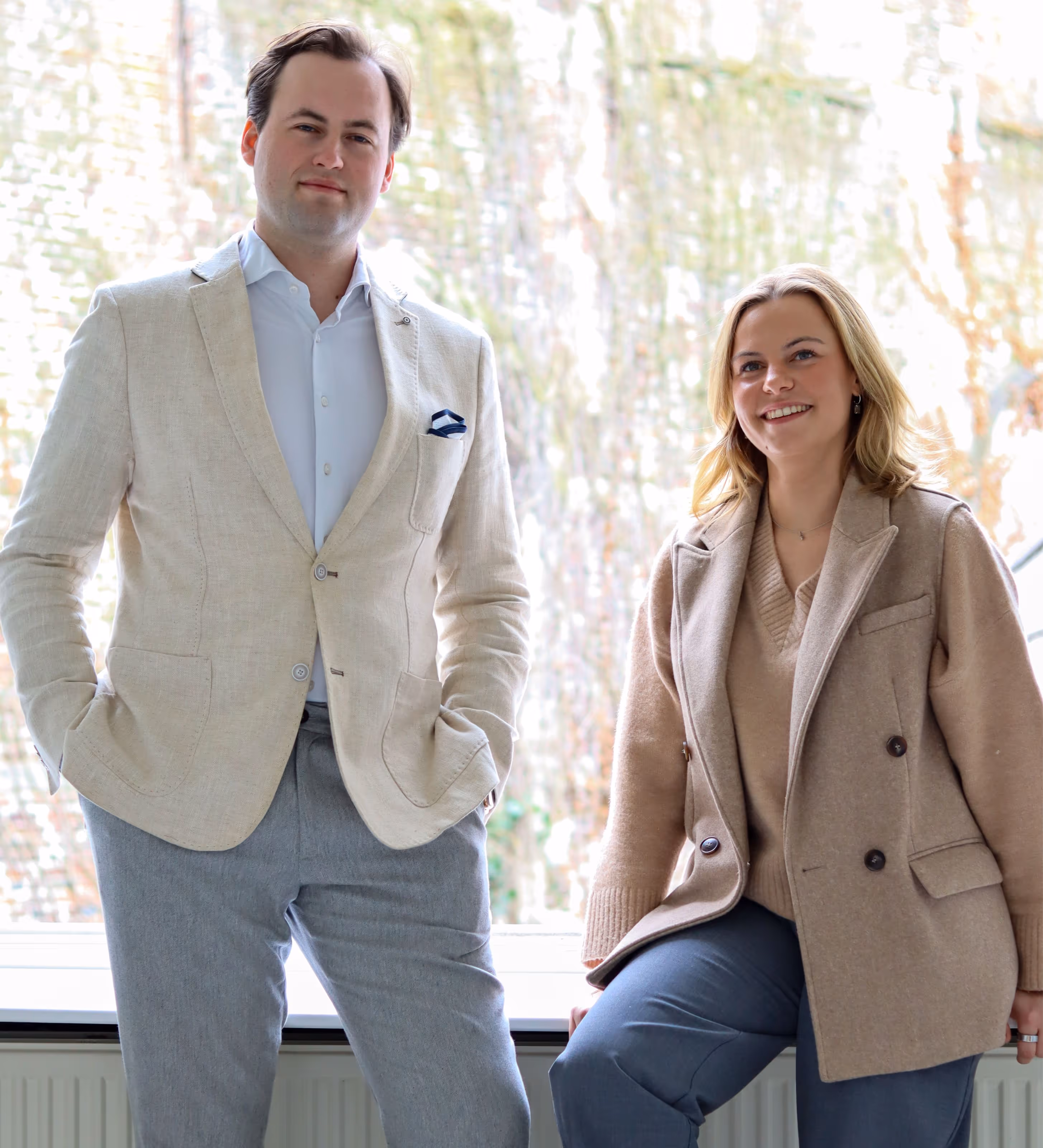 Lex en Nathalie als vastgoedmakelaars bij Bauwens Vastgoed