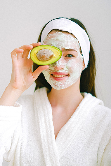 avocado place on womans face