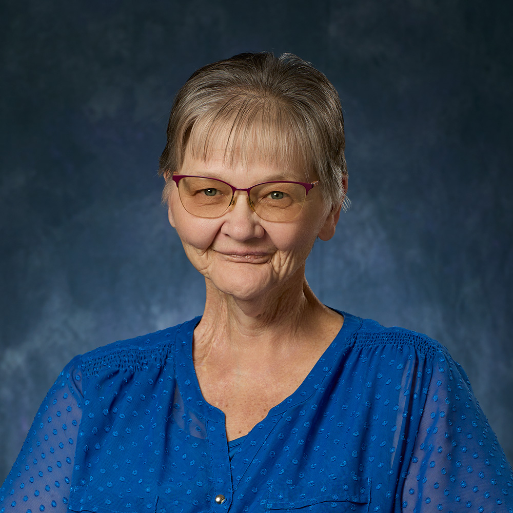 Headshot of Gloria Watrud