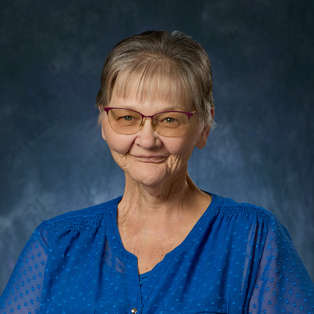 Headshot of Gloria Watrud