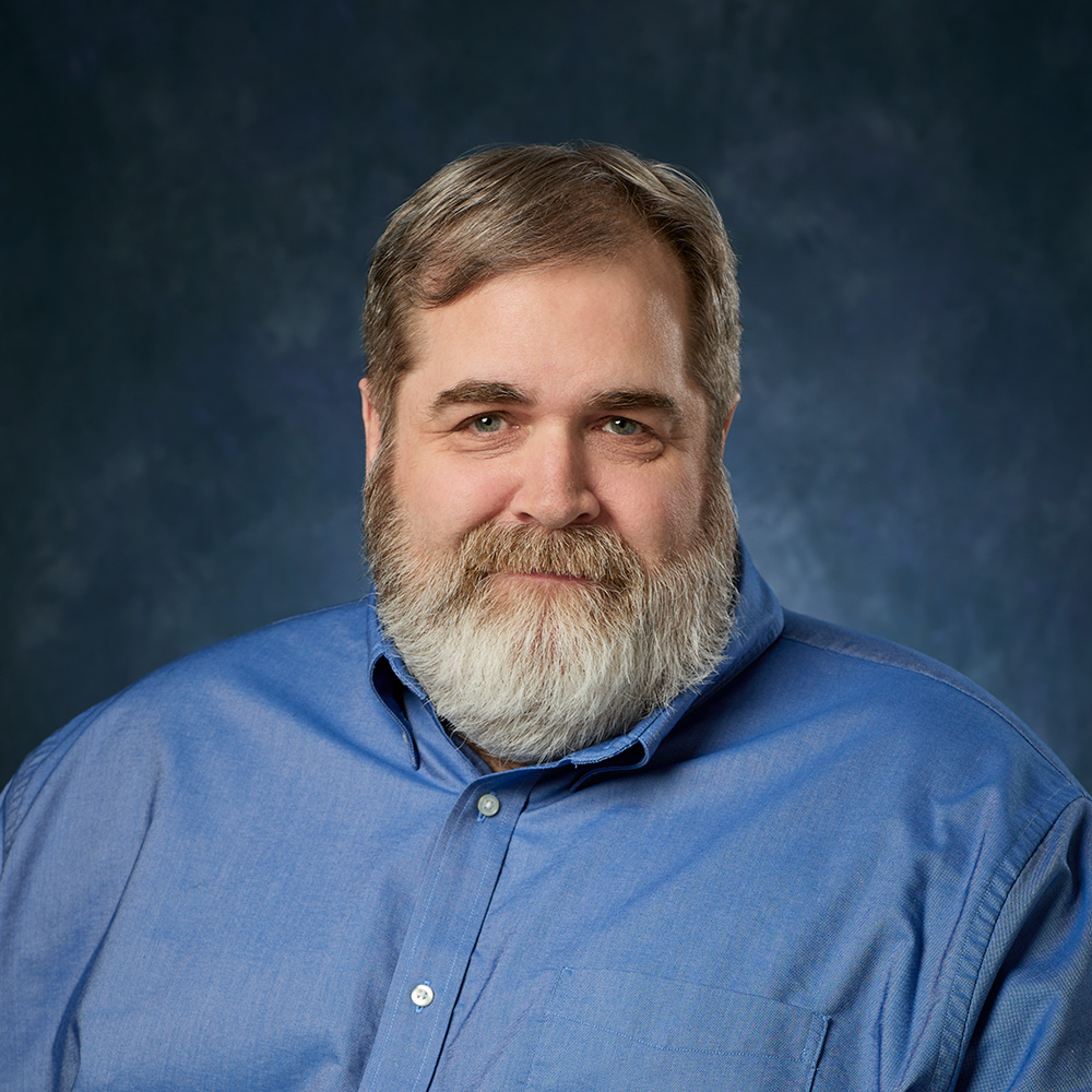 Headshot of Ryan Hughes