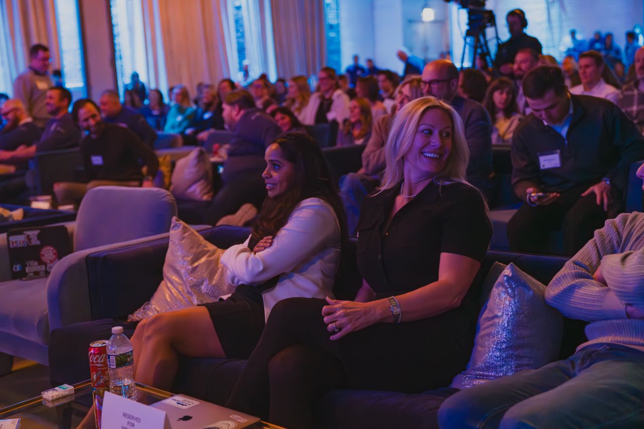 Virtual presenter displayed on large screen at event